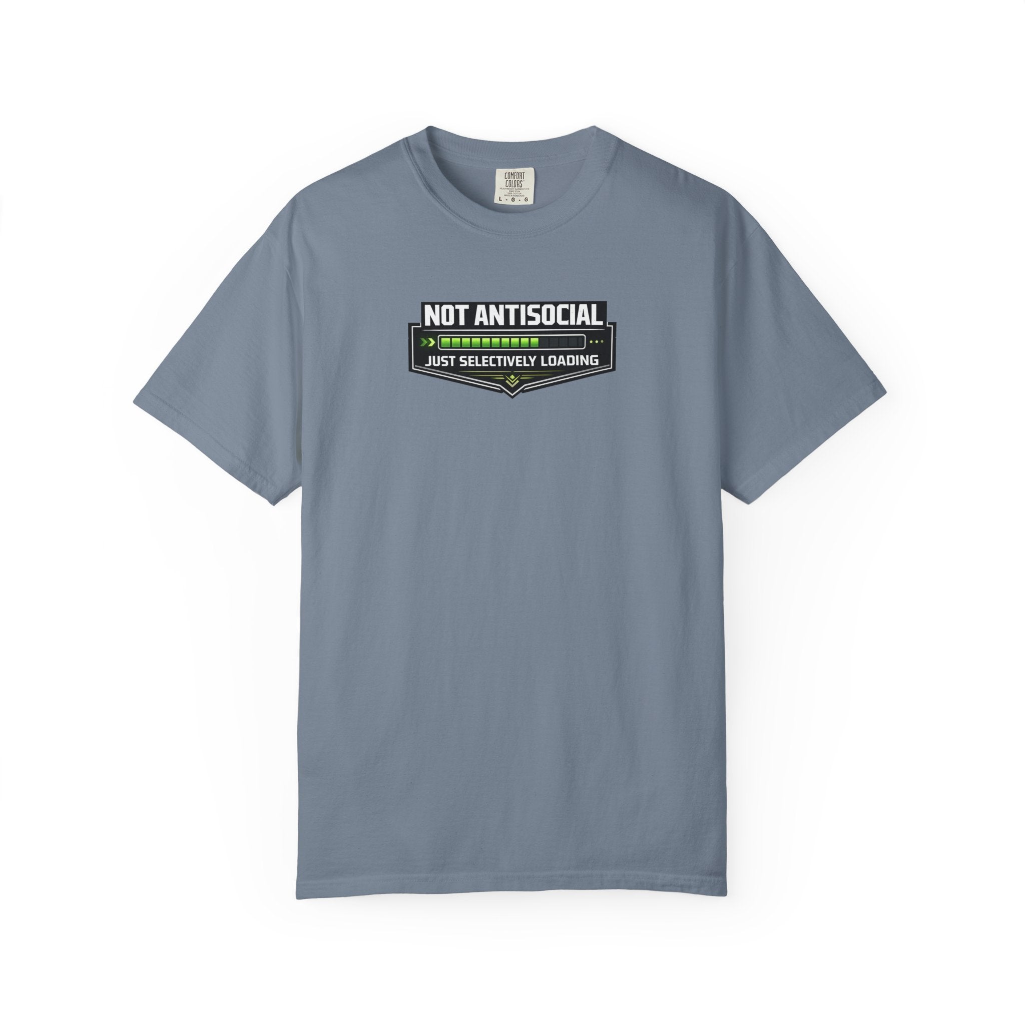 A slate blue short-sleeve t-shirt with a graphic on the chest that reads 'NOT ANTISOCIAL' above a progress bar and 'JUST SELECTIVELY LEARNING' below, displayed on a clean white background