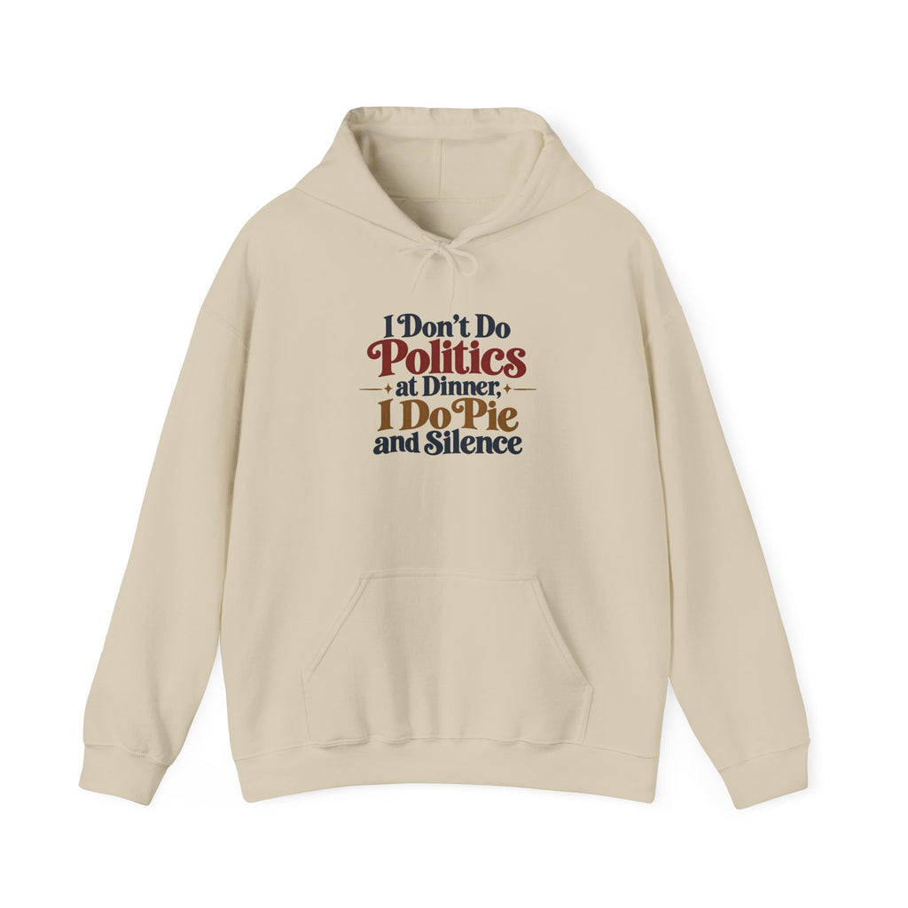 A beige pullover hoodie that features a colorful graphic on the chest with the words 'I dont Do Politics at Dinner I do Pie and Silence' in a rainbow of stylized fonts against a white background