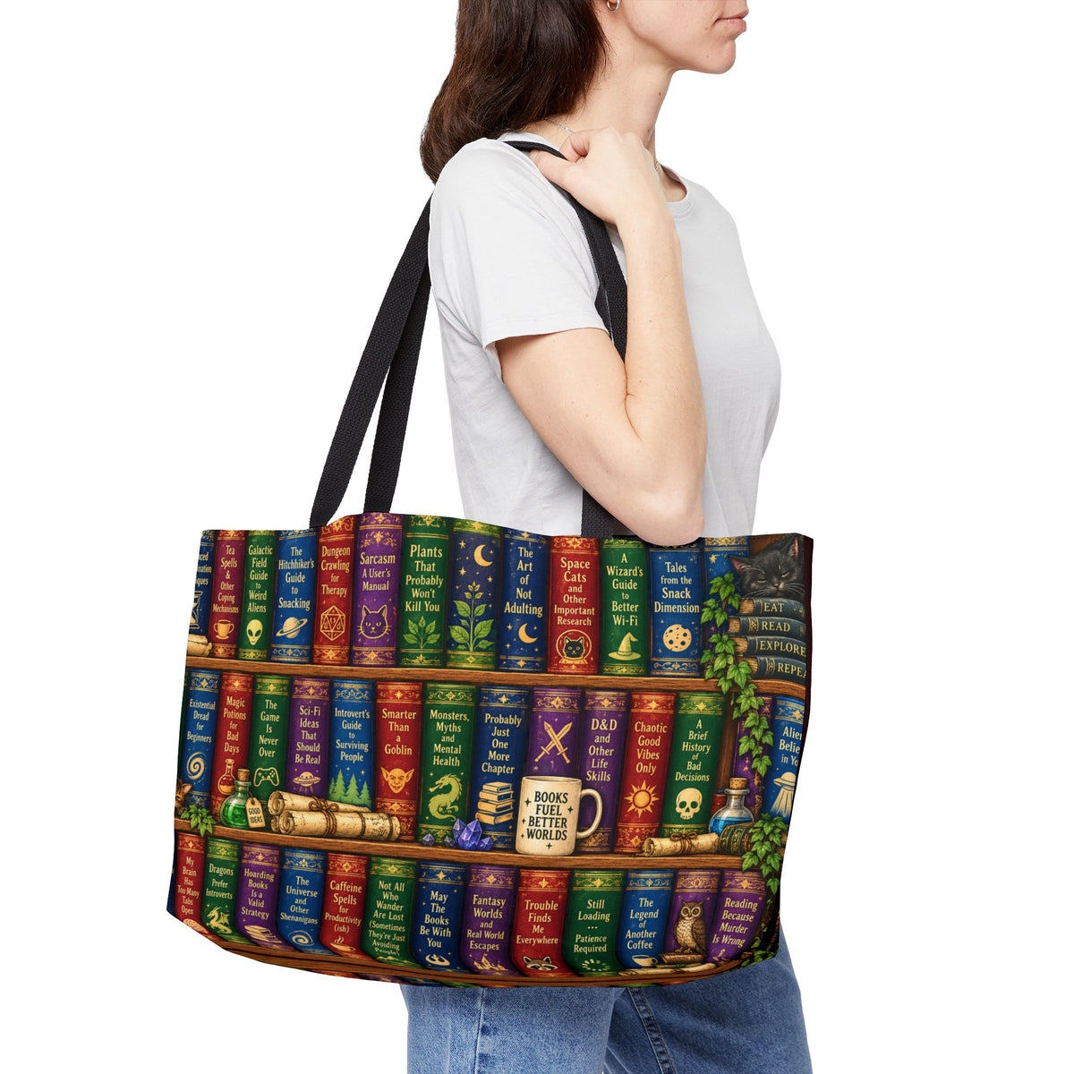 A woman wearing a white t-shirt and blue jeans carries a large tote bag printed with a colorful row of fantasy book spines. The bag features black shoulder straps and a detailed design with various potion mugs, scrolls, and magical symbols.