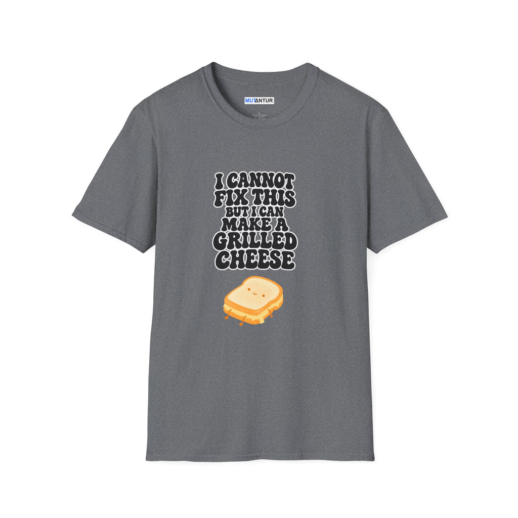 A dark gray short-sleeve t-shirt with a graphic print on the front. The print features the text 'I CANNOT FIX THIS BUT I CAN MAKE A GRILLED CHEESE' in a black distressed font above a cartoon illustration of a grilled cheese sandwich with melted yellow cheese and a small smiley face.