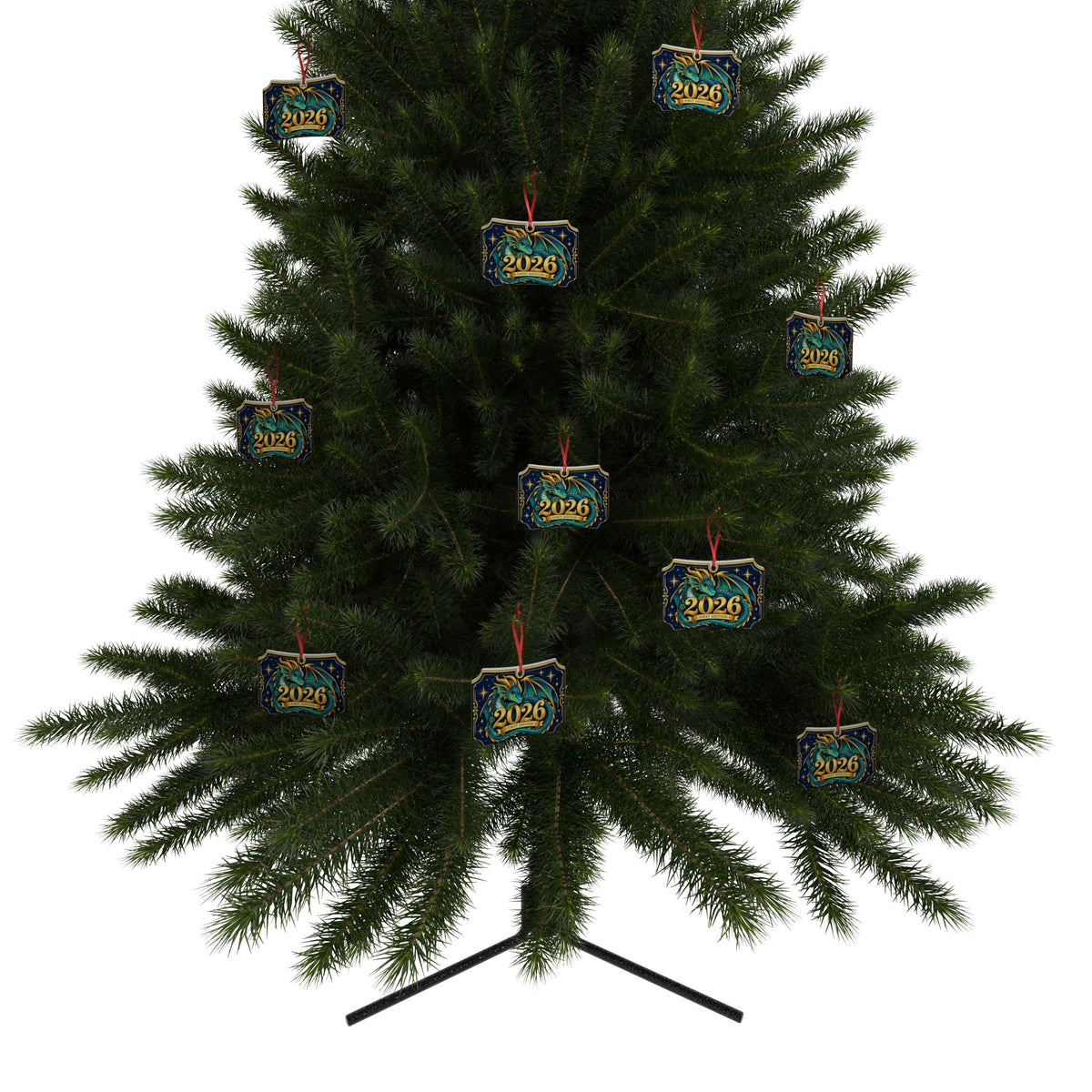 A green artificial Christmas tree on a black stand, decorated with multiple blue and gold square ornaments hanging from red ribbons against a plain white background.