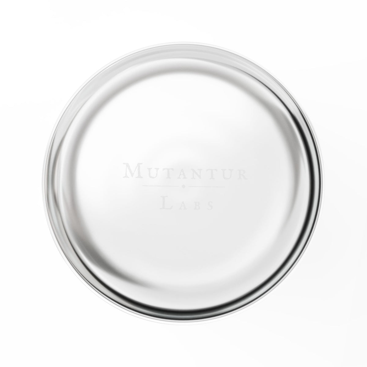 Bottom of a glass tumbler with a brand logo on a white background