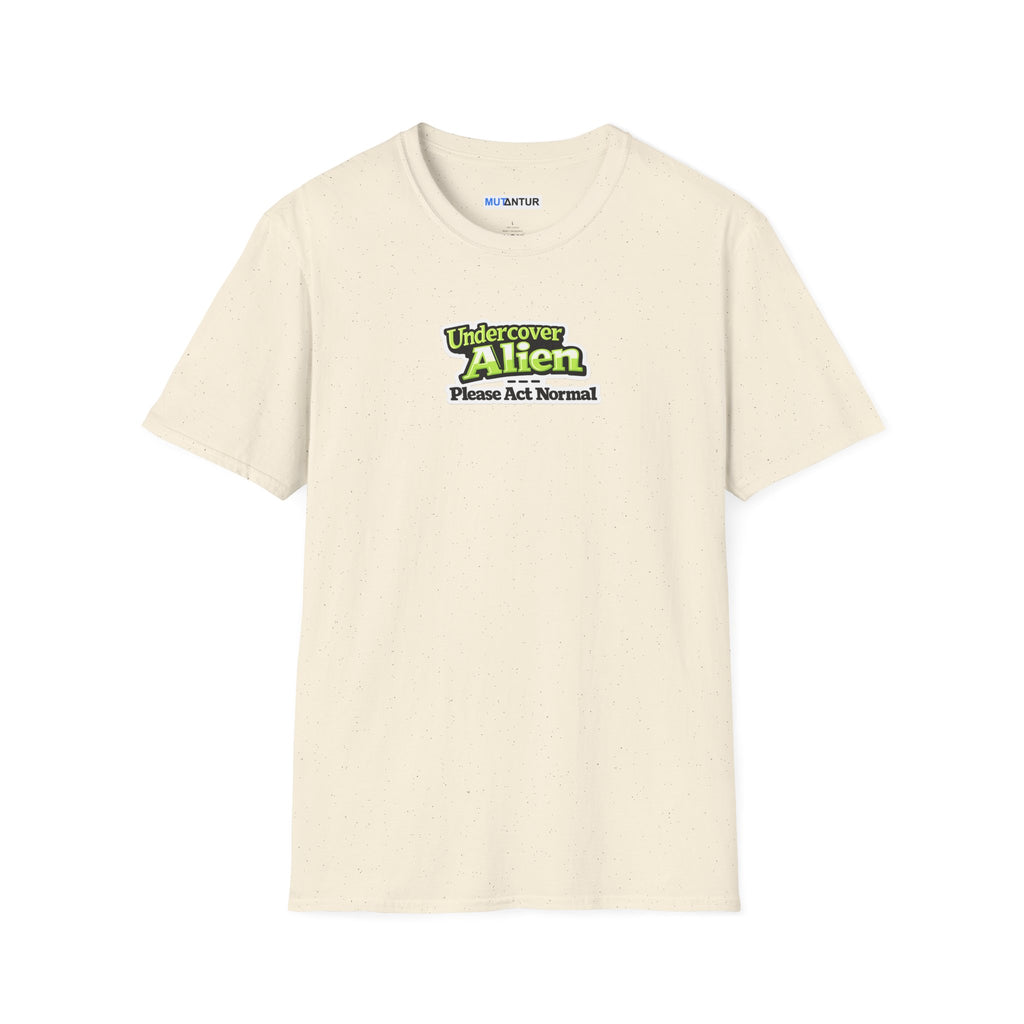 Beige short-sleeve t-shirt with a graphic on the chest that reads 'Undercover Alien Please Act Normal' in green and black
