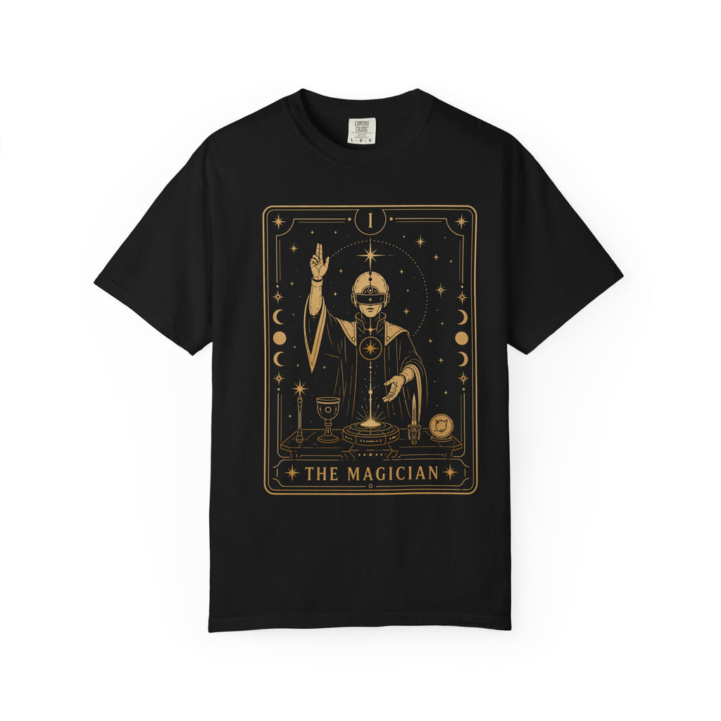 A black Comfort Colors t-shirt featuring The Magician from the Future Arcana collection, inspired by The Magician tarot card. A futuristic cosmic mystic channels radiant energy above a celestial altar within an elegant Art Deco frame rendered in vintage gold line art on a transparent background.