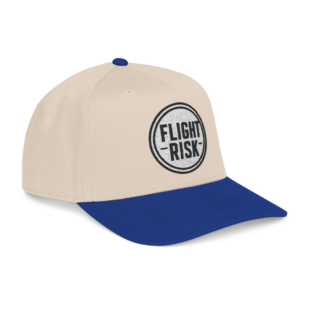 Beige and blue cap with a logo and text that says FLIGHT RISK on a white background