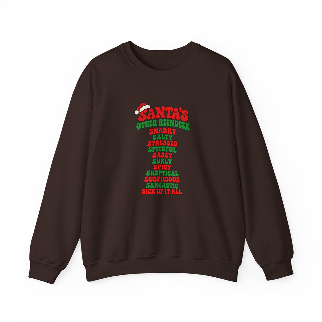 A chocolate brown crewneck sweatshirt featuring a red and green graphic print on the front that reads 'SANTA'S OTHER REINDEER' followed by a list of negative qualities in red and green text, shown against a plain white background.