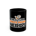A black ceramic mug with a graphic design that reads 'THE FUTURE NEEDS MORE NERDS' in white and orange lettering, accompanied by a small rocket illustration