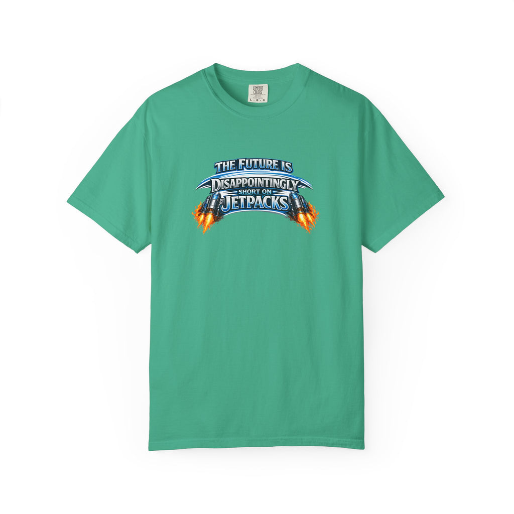 A green short-sleeve crewneck t-shirt featuring a graphic print on the chest that reads 'THE FUTURE IS DISAPPOINTINGLY SHORT ON JETPACKS' in stylized blue and orange lettering with flame effects.