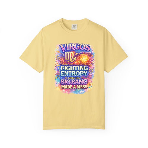 A pale yellow short-sleeve t-shirt with a colorful graphic on the chest featuring the Virgo zodiac symbol and the text 'Virgos Fighting Entropy Since the Big Bang Made a Mess'.