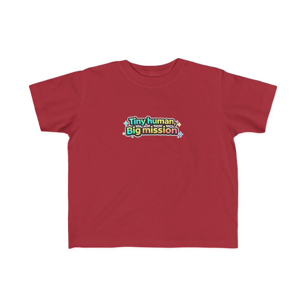 Red t-shirt with 'Tiny human, Big mission' text on a white background