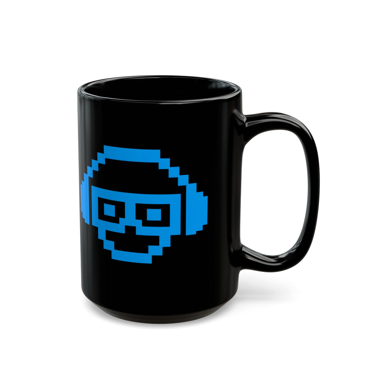 A glossy black ceramic mug featuring a bright blue pixel-art graphic of a headset on the front, set against a plain white background.