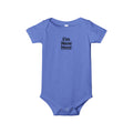Blue baby onesie with 'I'm new here' text on a white background