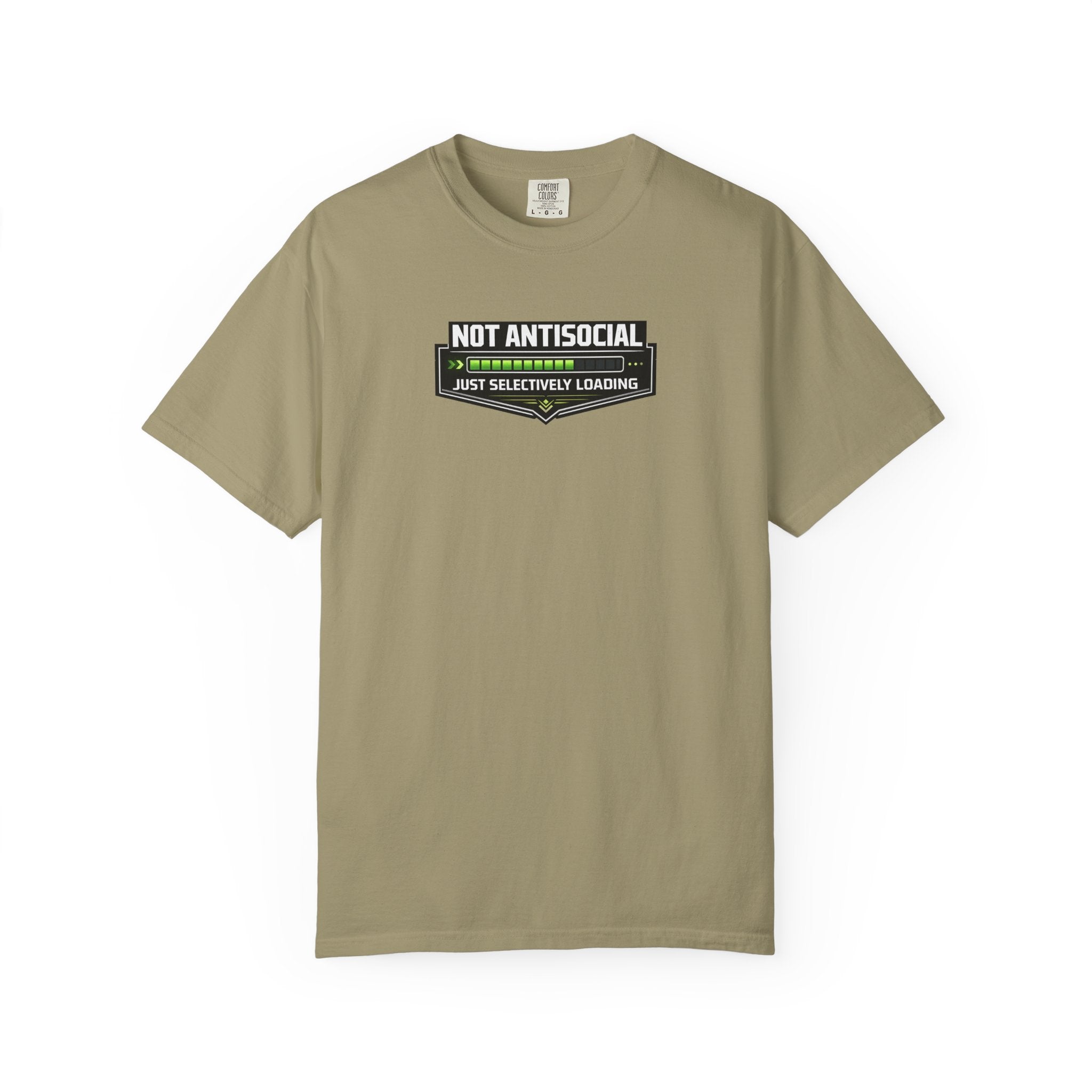 A  brown short-sleeve crewneck t-shirt in khaki beige, featuring a graphic on the chest that reads 'NOT ANTISOCIAL' above a progress bar with green checkmarks and the text 'JUST SELECTIVELY LEARNING' below,