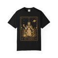 A Black t-shirt featuring The Starseer from the Future Arcana collection, inspired by The High Priestess tarot card. A serene cosmic mystic holds a glowing celestial sphere within an elegant Art Deco frame rendered in gold line art.