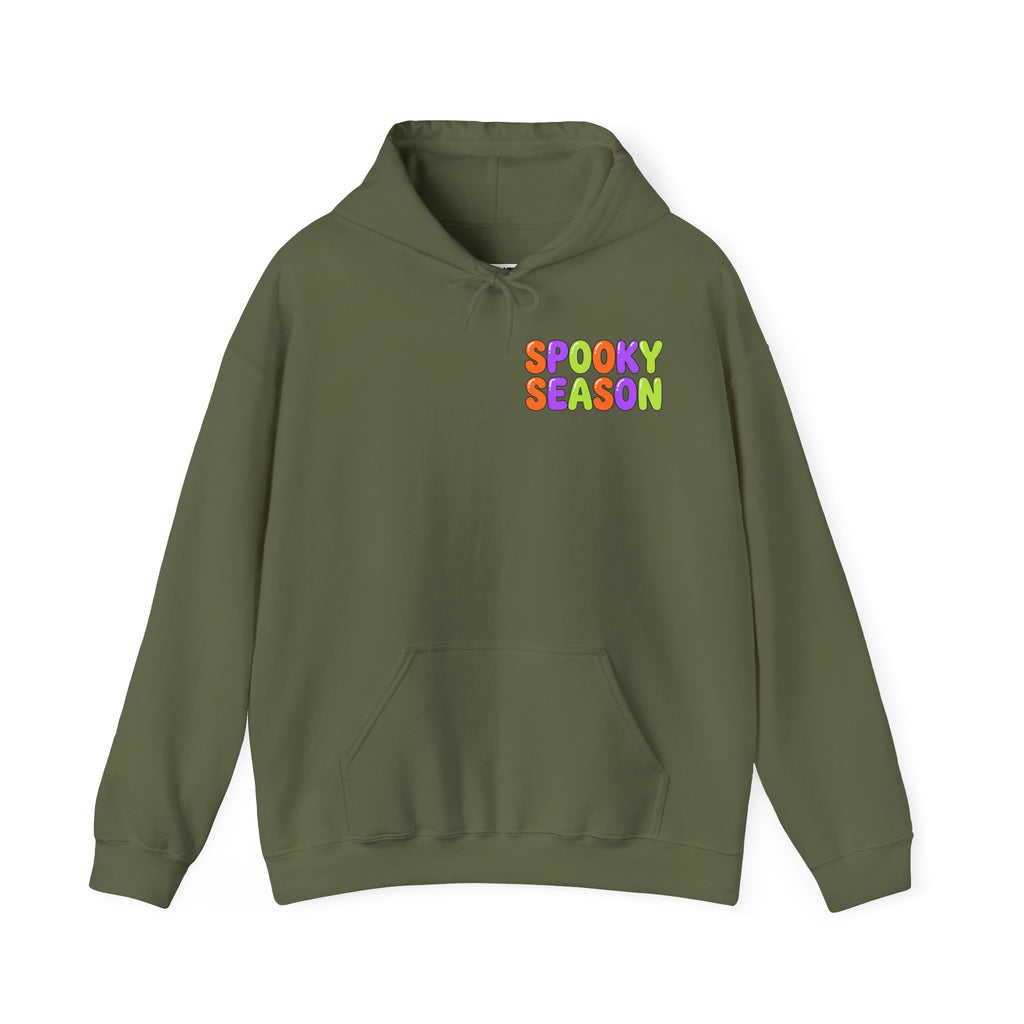 A military green hoodie with a colorful graphic on the chest that reads 'SPOOKY SEASON' in a rainbow gradient font, displayed against a solid white background.