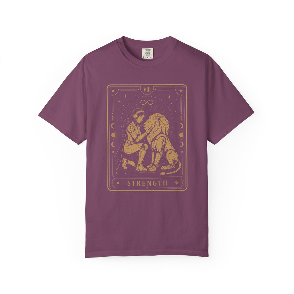 A purple short-sleeve crewneck t-shirt featuring a gold tarot card graphic of a woman and lion with the word 'STRENGTH' on the front, displayed against a plain white background.
