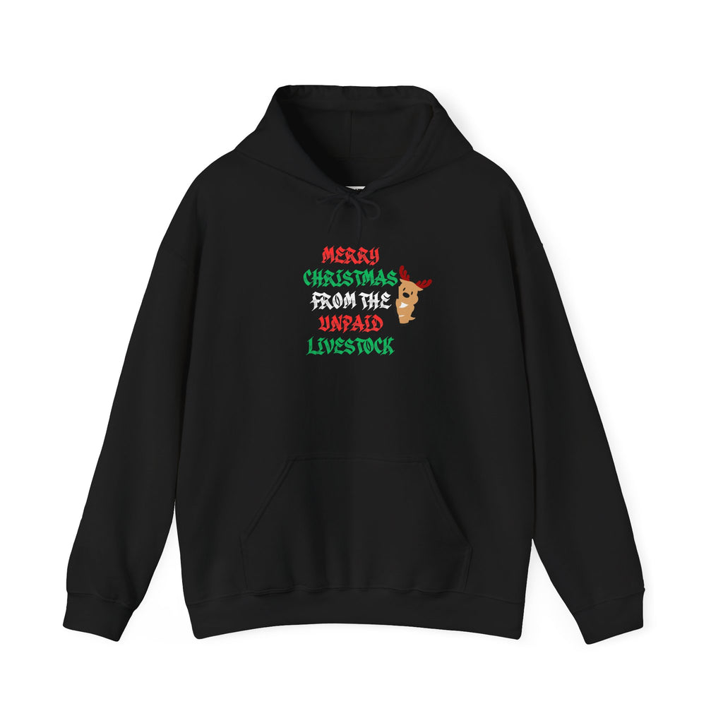 A black pullover hoodie with a festive graphic on the chest that reads 'MERRY CHRISTMAS FROM THE UNPAID LIVESTOCK' in red and green lettering, accompanied by a small cartoon reindeer.