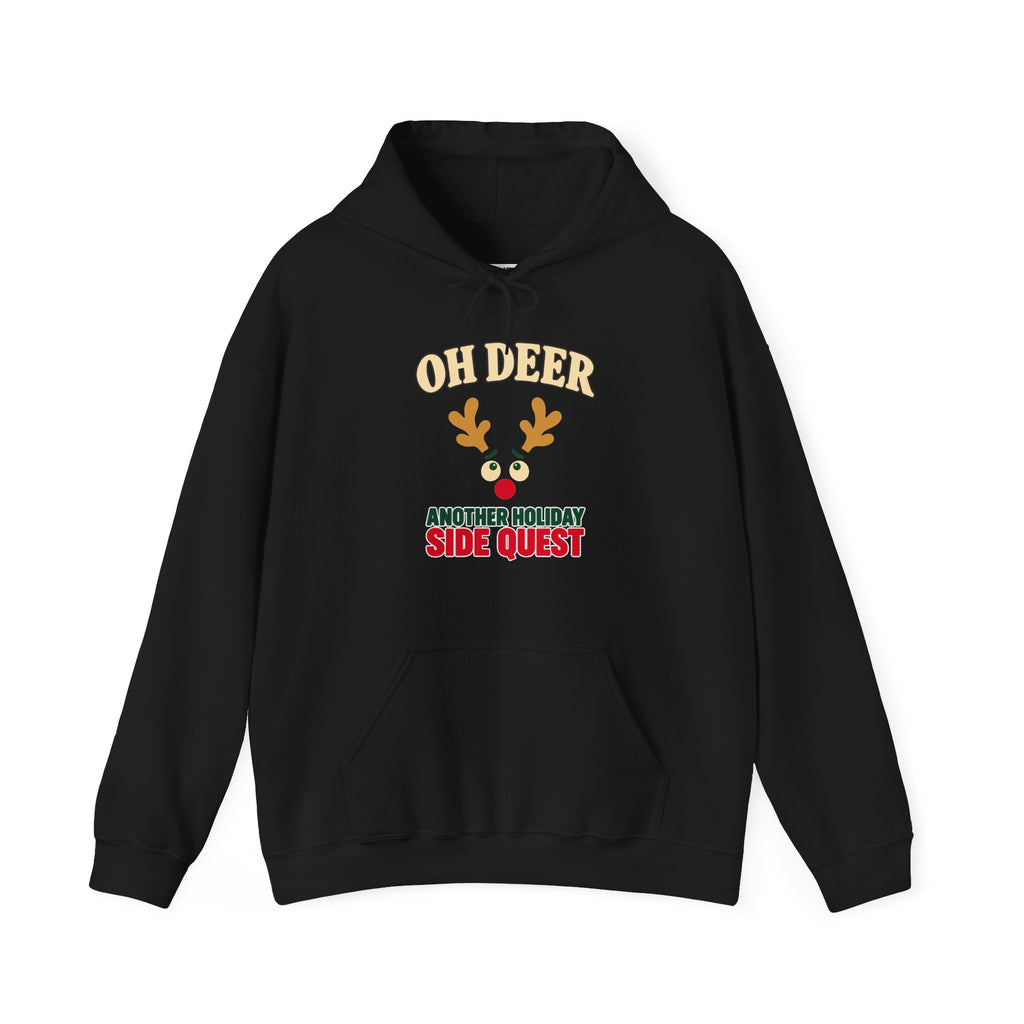 A black hoodie with a graphic on the chest. The graphic features the text 'OH DEER' in a beige arched font above a cartoon reindeer face with gold antlers and a red nose, followed by the text 'ANOTHER HOLIDAY SIDE QUEST' in green and red.