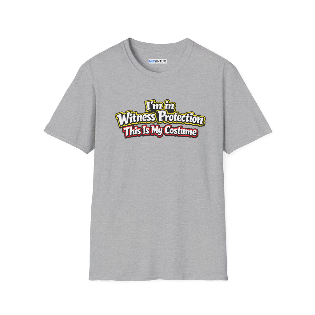 Gray short-sleeve crewneck t-shirt featuring a graphic on the chest that reads 'I'm in Witness Protection This Is My Costume' in a stylized, vintage font with green, yellow, and red accents