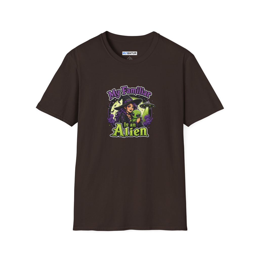 A brown crewneck t-shirt featuring a colorful graphic print on the front with the text 'My Familiar Is an Alien' and an illustration of a witch and a green alien.