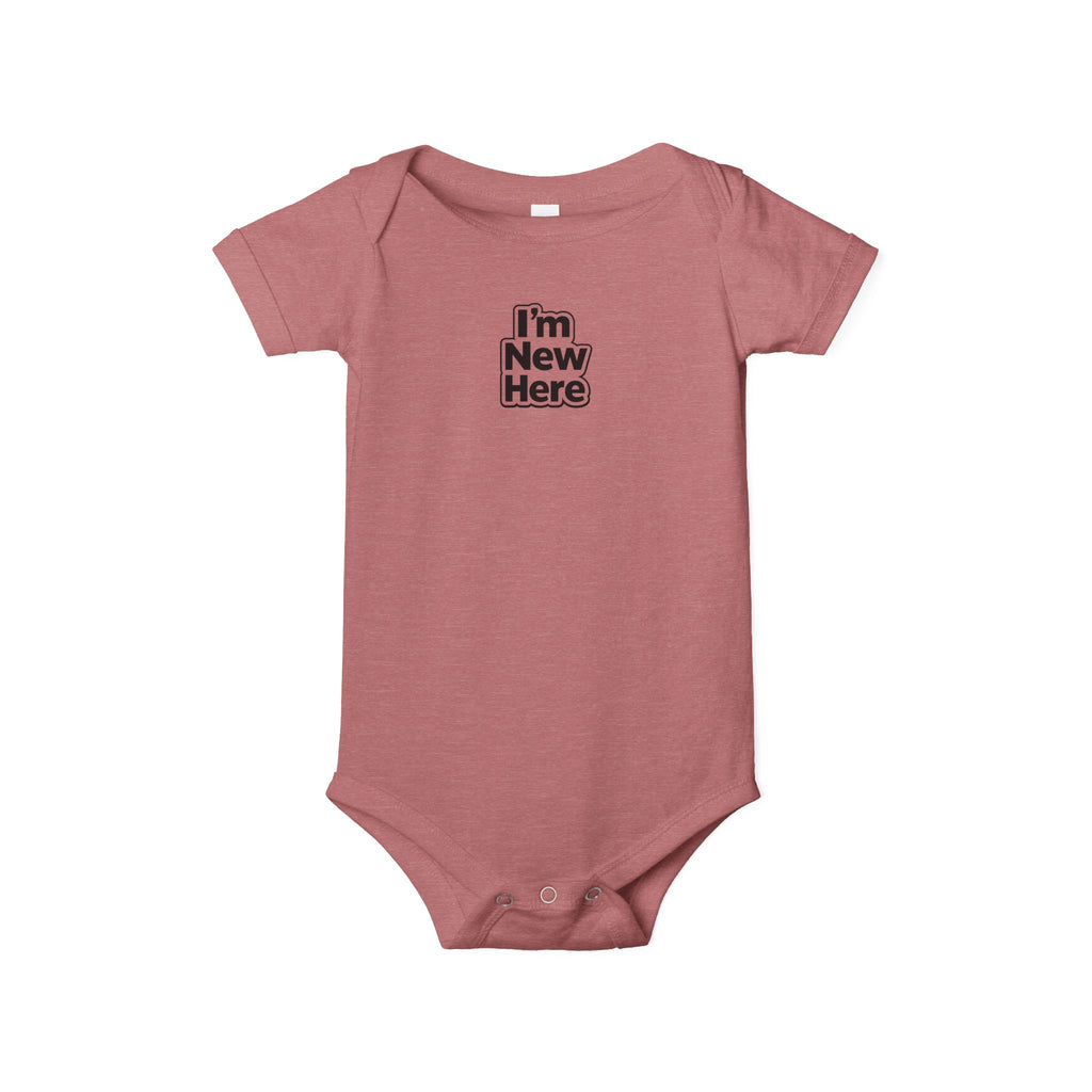 Pink baby onesie with 'Sweet Dreams' text on a white background