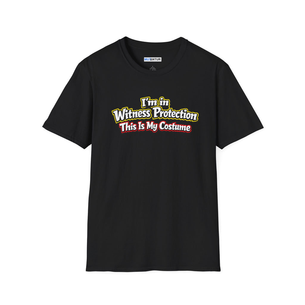 Black short-sleeve crewneck t-shirt featuring a graphic on the chest that reads 'I'm in Witness Protection This Is My Costume' in a stylized, vintage font with green, yellow, and red accents