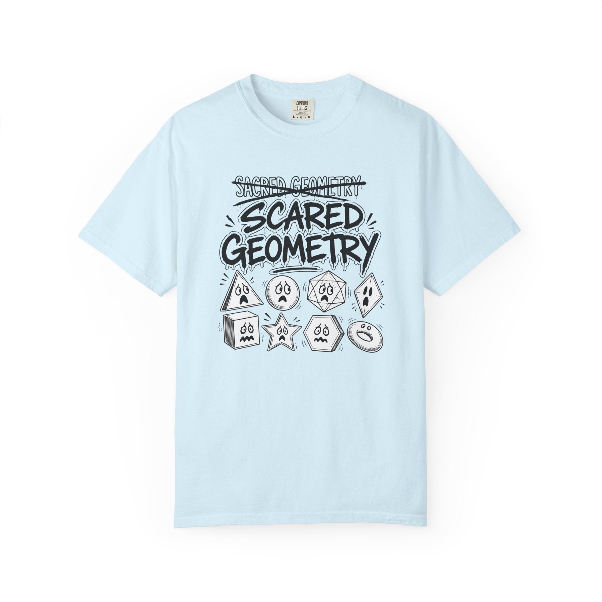 A light blue short-sleeve t-shirt with a graphic print on the front that reads 'SCARED GEOMETRY' in black and white, accompanied by various cartoonish geometric shapes.