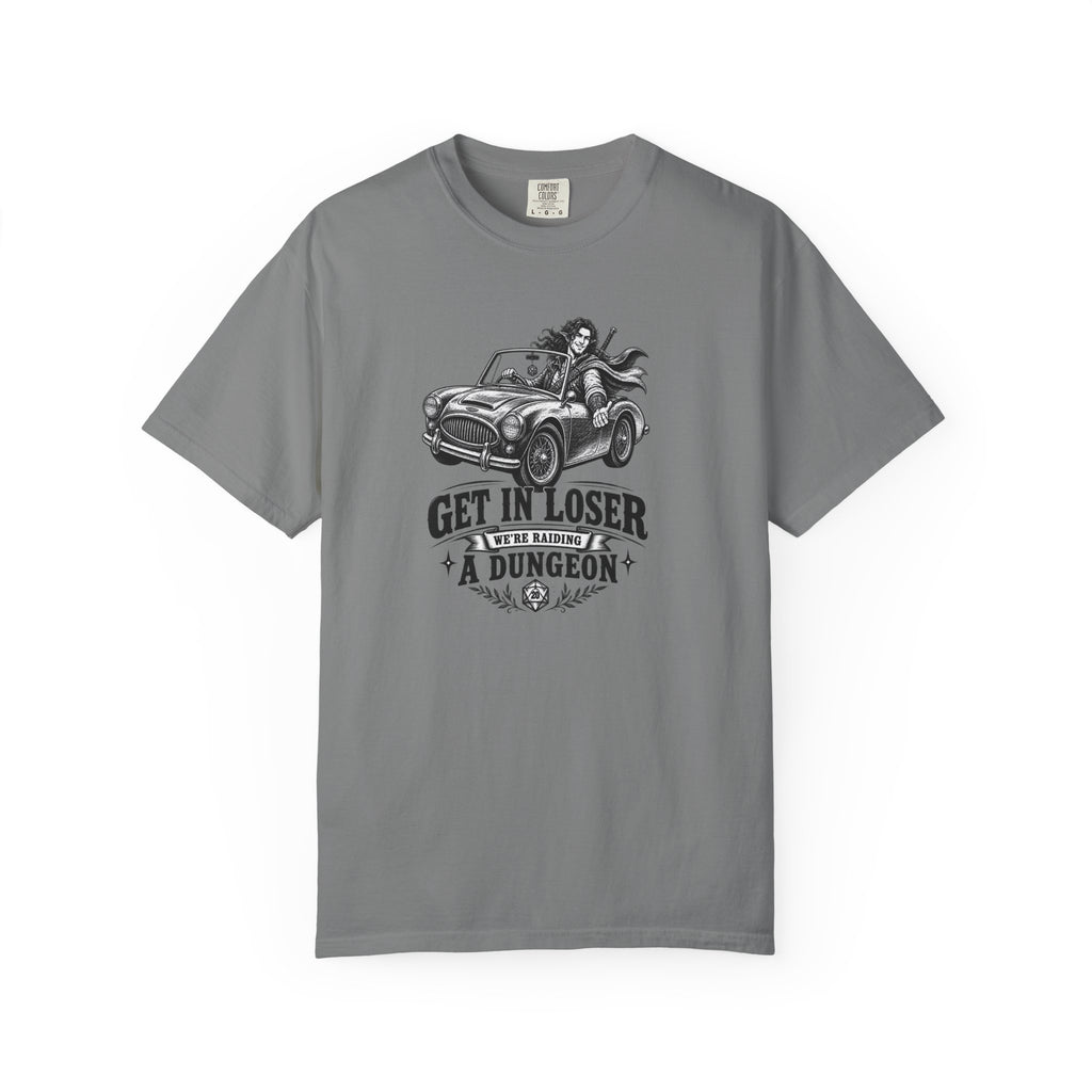 a grey t shirt with a black and white design of an elf gamer sitting in a convertible with the word Gei In Loser We're raiding a dungeon  against a white background