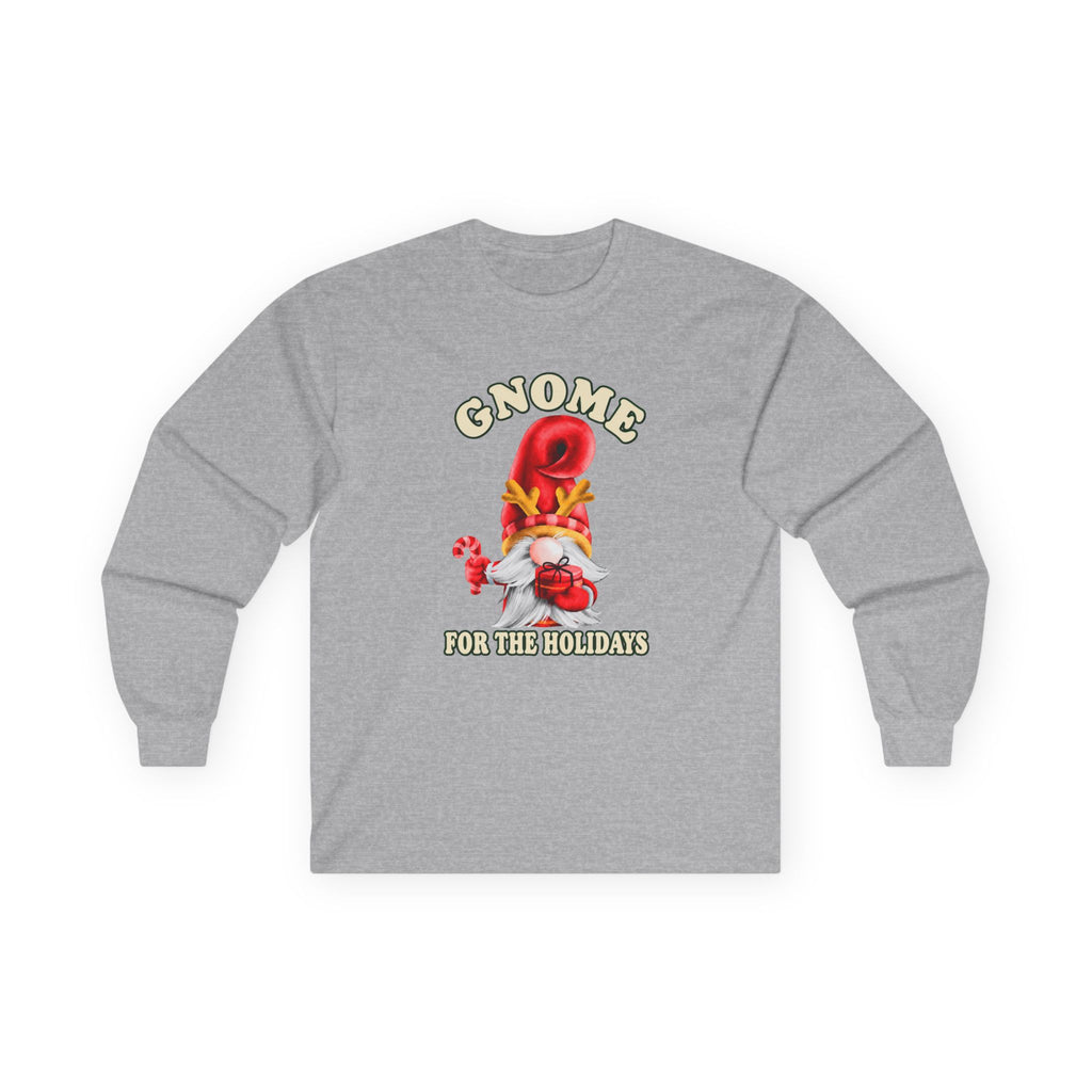 A heather gray long-sleeve t-shirt with a festive gnome graphic on the chest. The graphic features a red hot air balloon, a small red-and-white gnome, and the text 'GNOME FOR THE HOLIDAYS' in yellow and white.