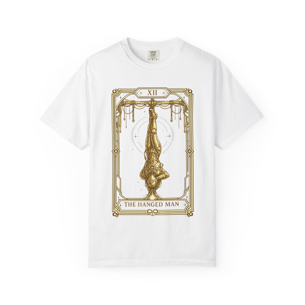 a white Comfort Colors t-shirt featuring The Hanged Man from the Future Arcana collection, inspired by The Hanged Man tarot card. A futuristic explorer hangs suspended upside down within an elegant Art Deco celestial frame, illustrated in vintage gold line art on a transparent background.