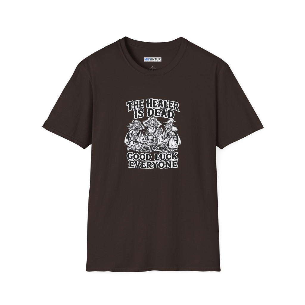 A Brown short-sleeve crewneck t-shirt with a black and white graphic print on the front. The graphic features the text 'THE HEALER IS DEAD' and 'GOOD LUCK EVERYONE' surrounding an illustration of three figures and a skeleton
