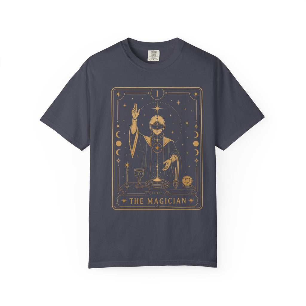 A dark navy blue short-sleeve t-shirt with a gold-colored graphic of 'The Magician' tarot card printed on the chest, displayed against a solid white background.