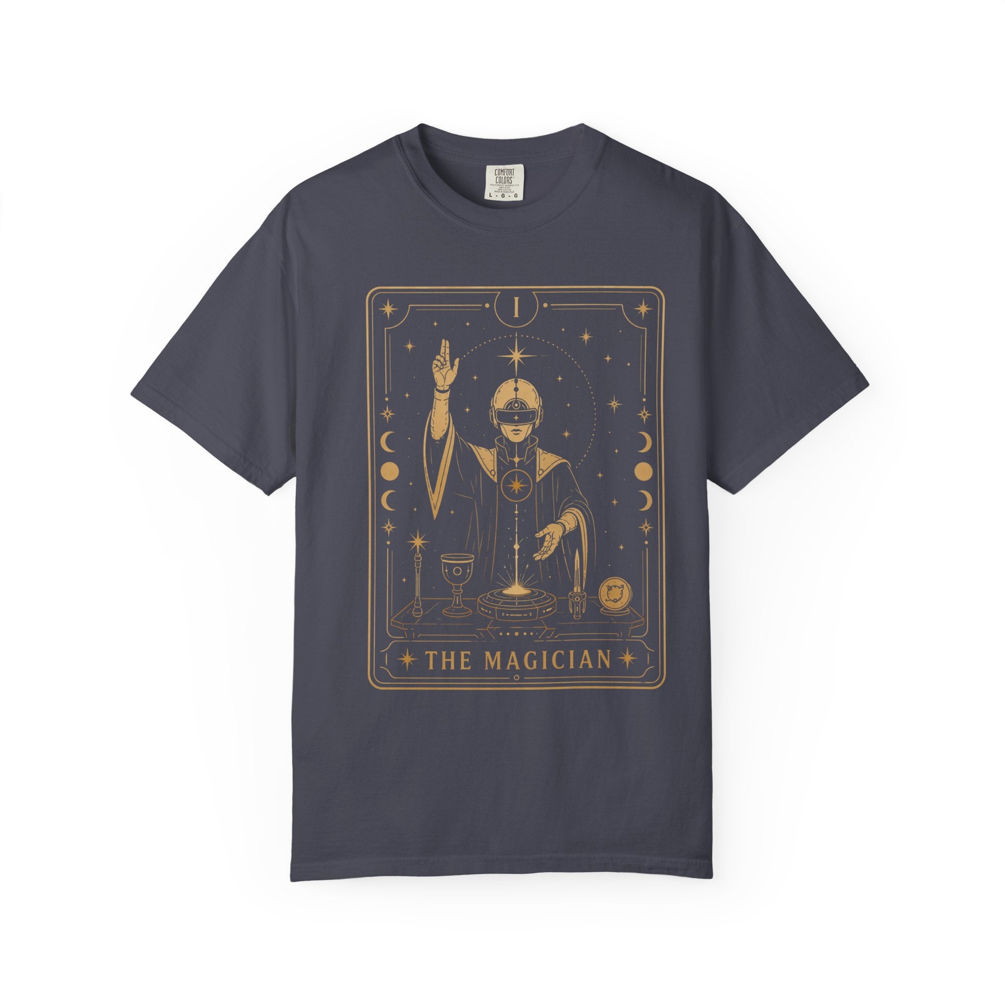 A dark navy blue short-sleeve t-shirt with a gold-colored graphic of 'The Magician' tarot card printed on the chest, displayed against a solid white background.