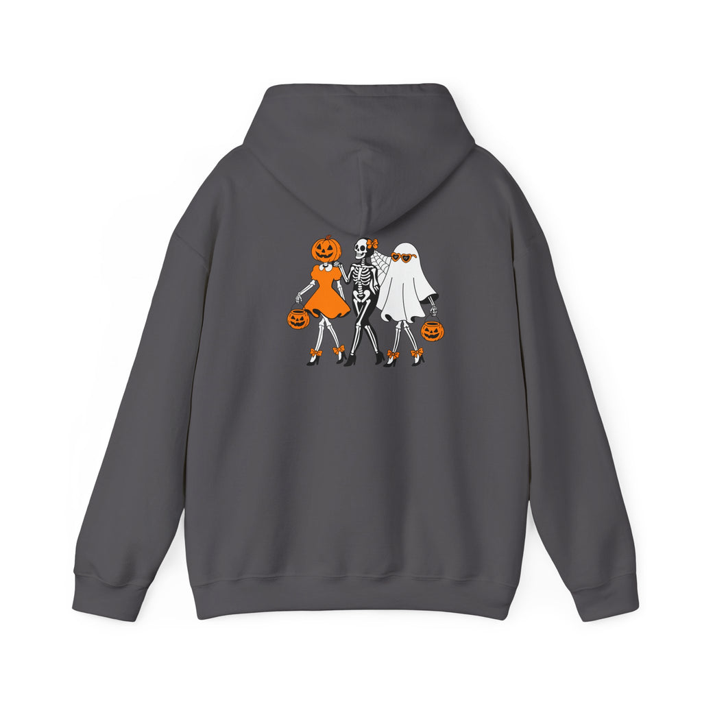 A dark gray hoodie shown from the back, featuring a graphic print of three Halloween characters: a pumpkin-headed girl in orange, a skeleton in black and white, and a ghost character in white holding a pumpkin.