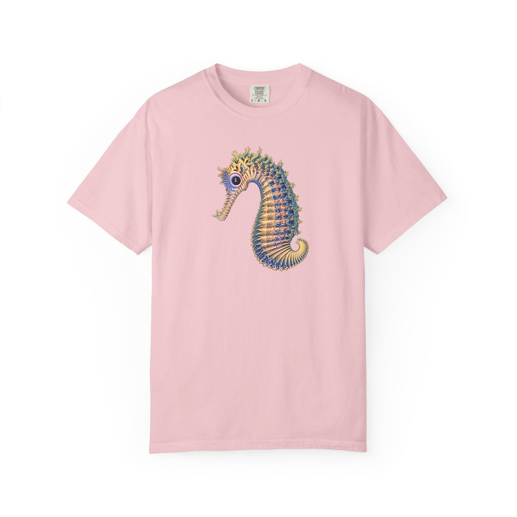 A light pink short-sleeve crewneck t-shirt featuring a colorful seahorse graphic printed on the center chest, displayed against a clean white background.