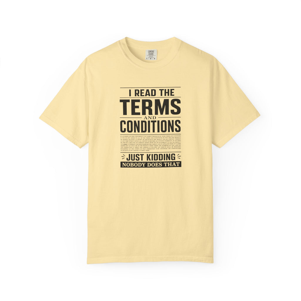 A pale yellow short-sleeve t-shirt with a black text graphic on the front reading 'I READ THE TERMS AND CONDITIONS JUST KIDDING NOBODY DOES THAT' in a newspaper-style layout, shown against a plain white background.