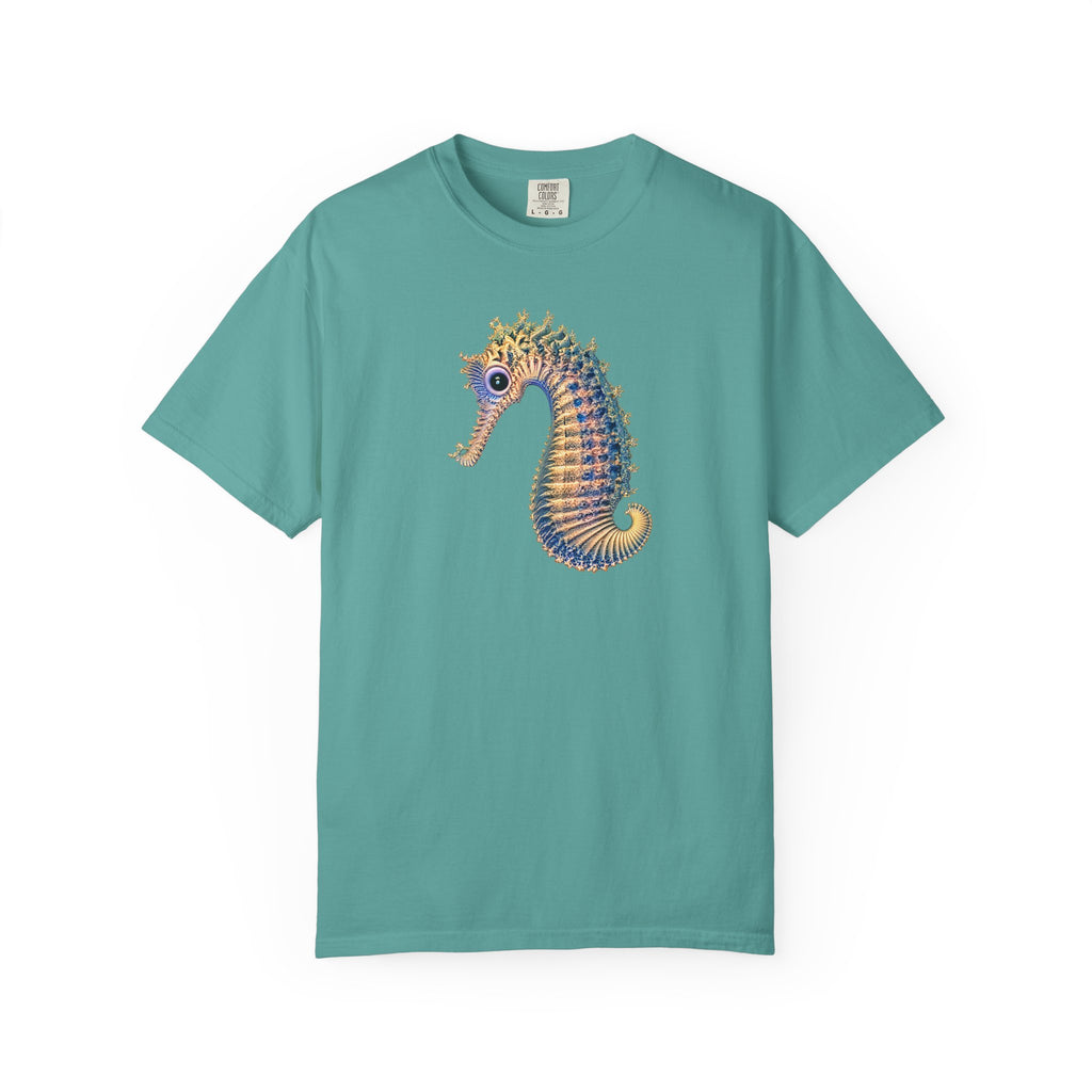 A teal short-sleeve crewneck t-shirt featuring a colorful graphic of a seahorse on the chest, displayed against a solid white background.