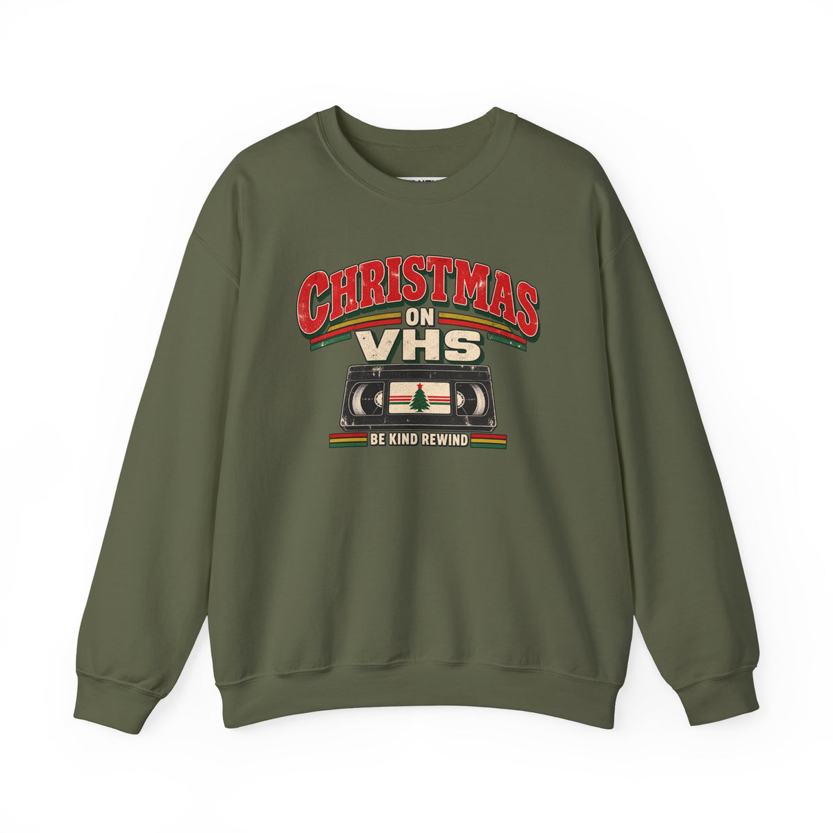 An olive green crewneck sweatshirt featuring a retro VHS graphic on the chest with the text 'CHRISTMAS ON VHS' and 'BE KIND REWIND' in red, beige, and green.

Details