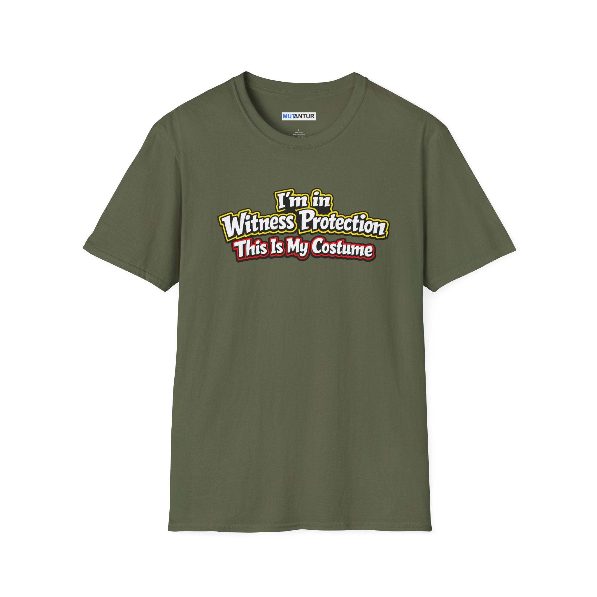 Green short-sleeve crewneck t-shirt featuring a graphic on the chest that reads 'I'm in Witness Protection This Is My Costume' in a stylized, vintage font with green, yellow, and red accents