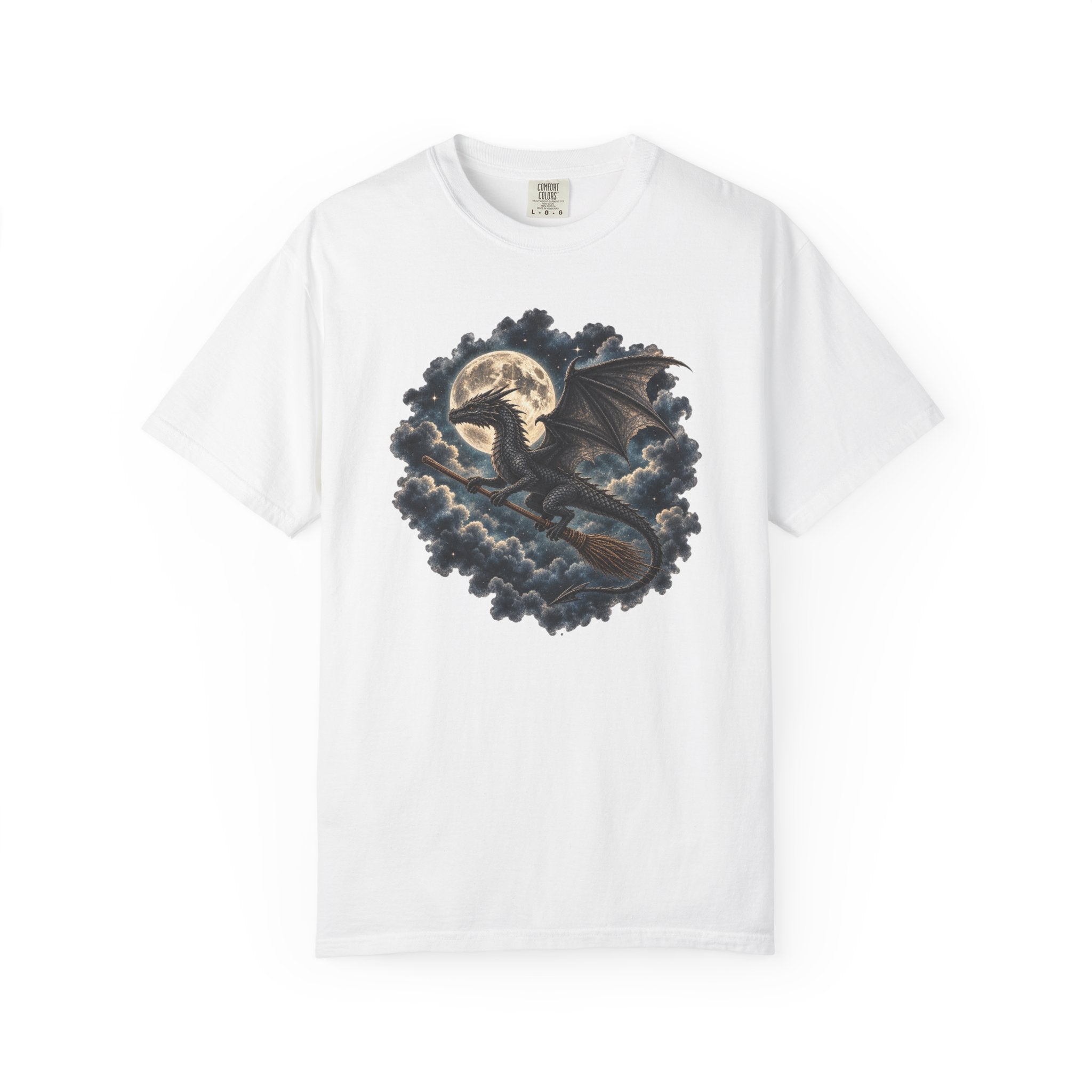 A white short-sleeve crewneck t-shirt featuring a detailed graphic print of a dark dragon flying over stormy clouds with a full moon in the background.
