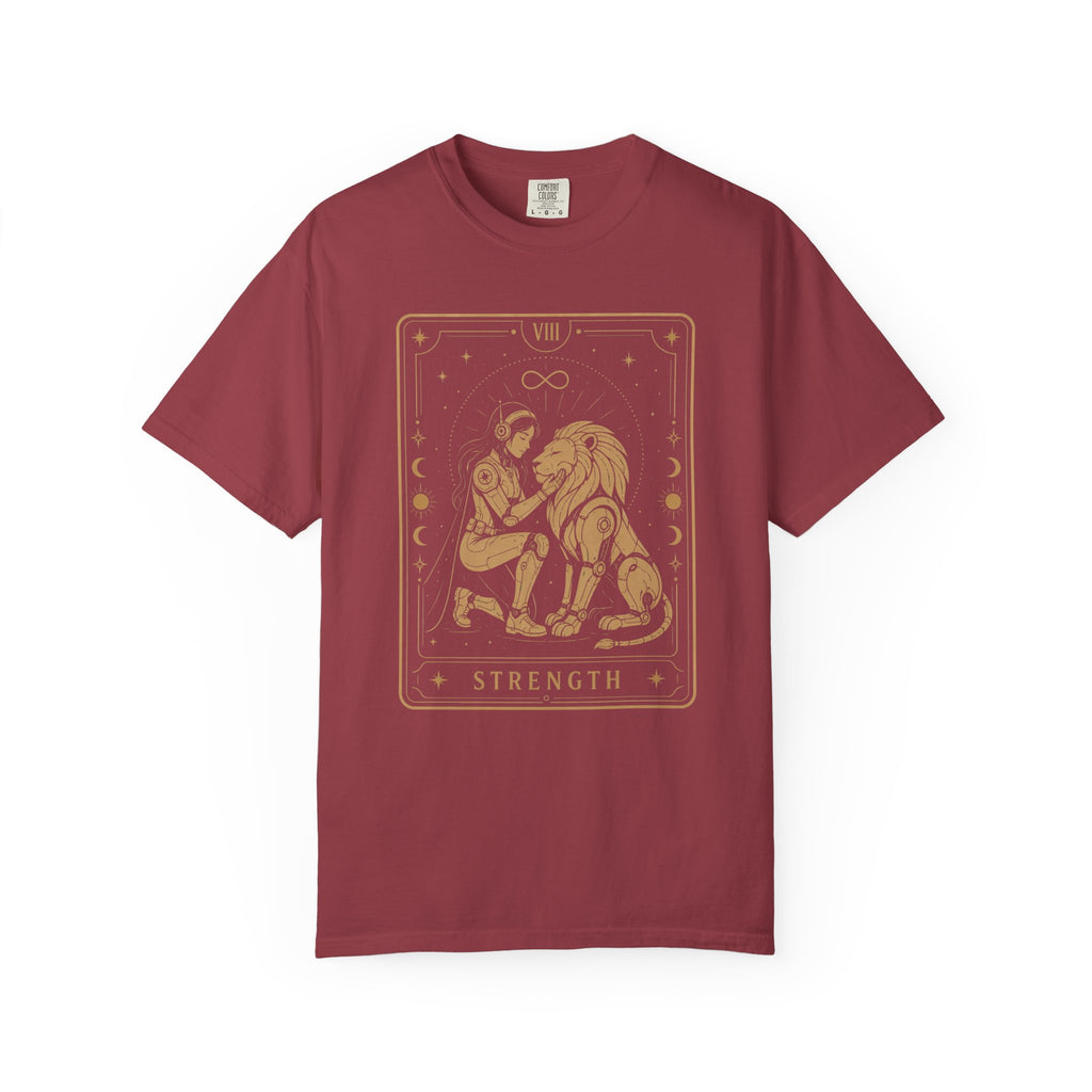 A red  short-sleeve crewneck t-shirt featuring a gold tarot card graphic of a man and lion with the word 'STRENGTH' on the front, displayed against a plain white background.