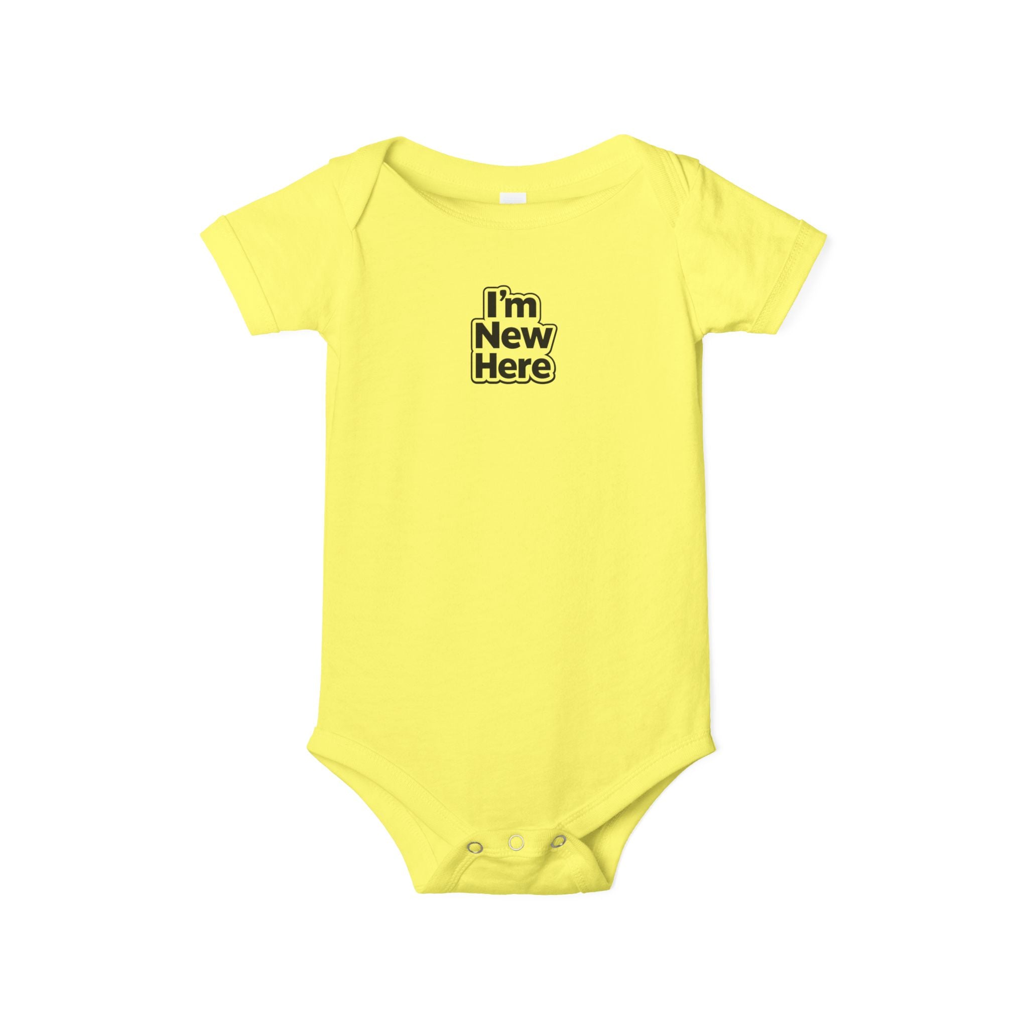 Yellow baby onesie with 'I'm New Here' text on a white background
