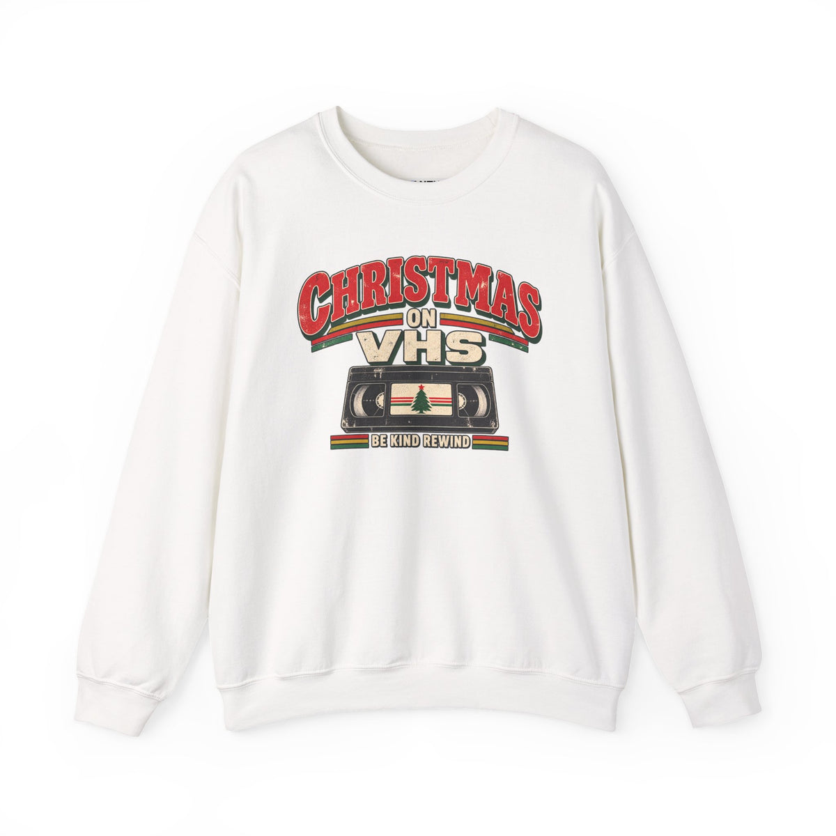 A beige crewneck sweatshirt featuring a retro VHS graphic with the text 'CHRISTMAS ON VHS' and 'BE KIND REWIND' on a white background.