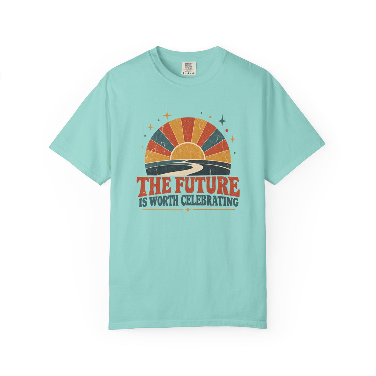 A light aqua blue short-sleeve t-shirt with a retro sunset graphic and the text 'THE FUTURE IS WORTH CELEBRATING' printed on the chest, displayed against a solid white background.