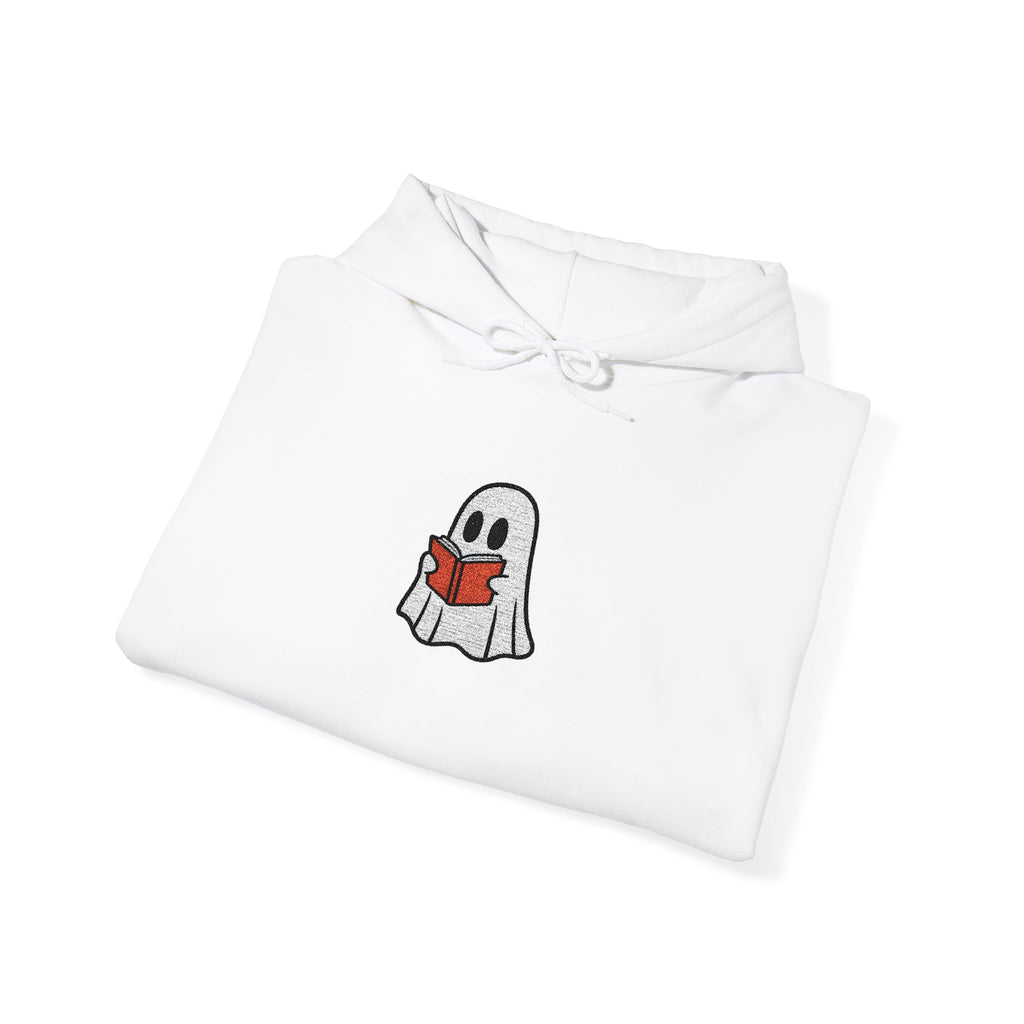 A folded white hoodie with a small embroidered cartoon ghost holding a red book on the chest, shown on a clean white background.
