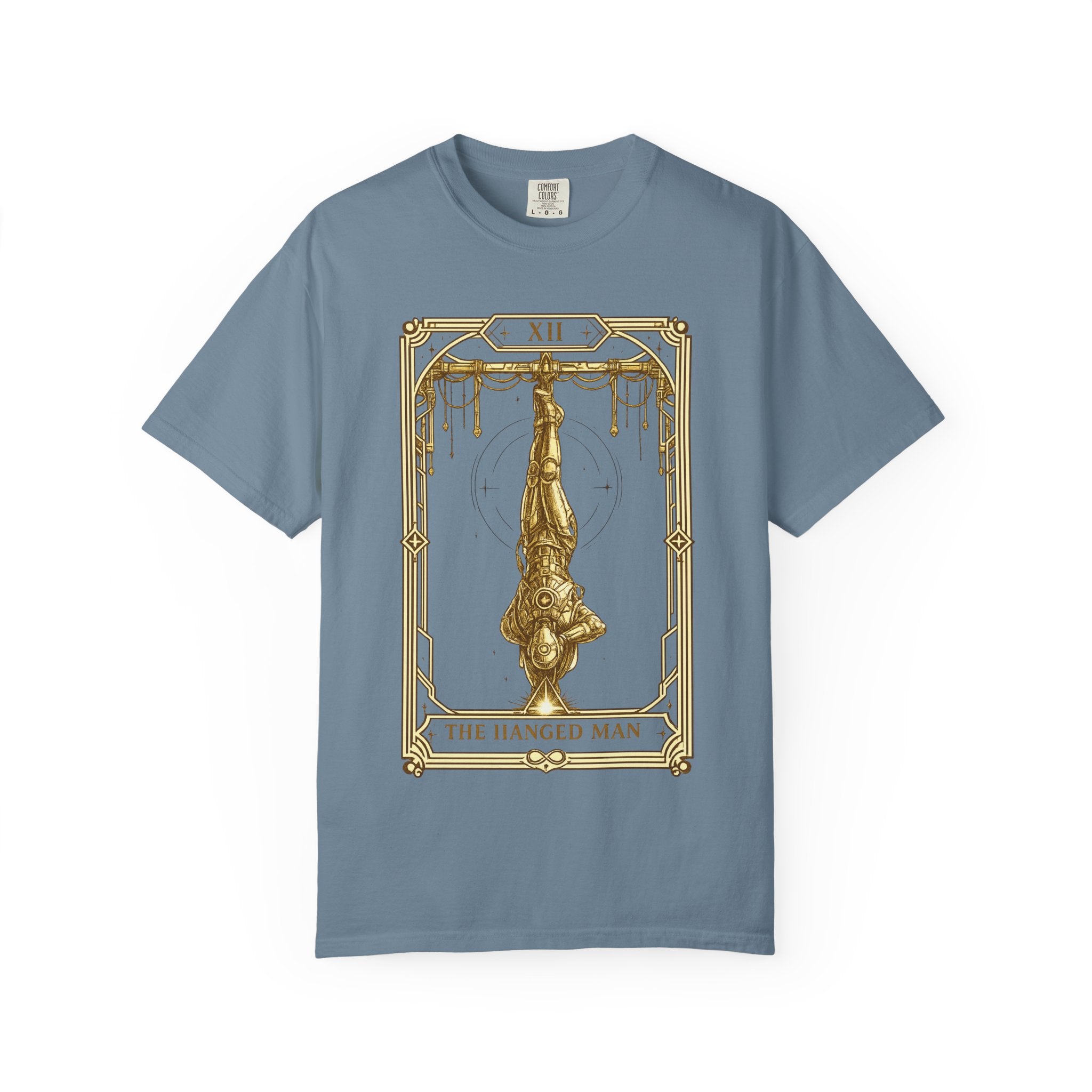 a blue crewneck t-shirt featuring The Hanged Man from the Future Arcana collection, inspired by The Hanged Man tarot card. A futuristic explorer hangs suspended upside down within an elegant Art Deco celestial frame, illustrated in vintage gold line art on a transparent background.