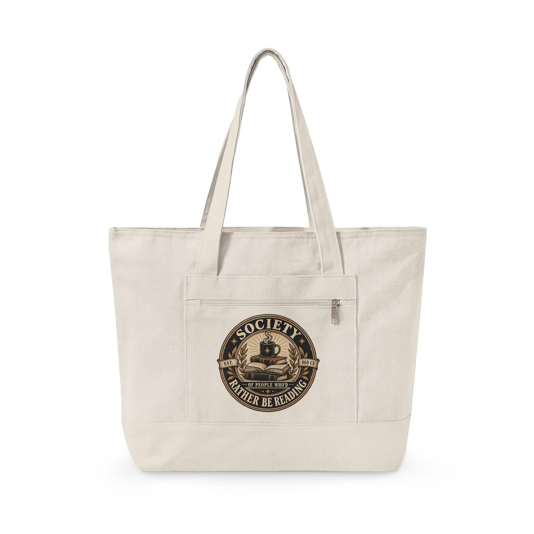 An off-white canvas tote bag with dual shoulder straps, a front zippered pocket, and a circular vintage-style book illustration graphic on the front pocket. The graphic features the text 'SOCIETY FATHER BE READING