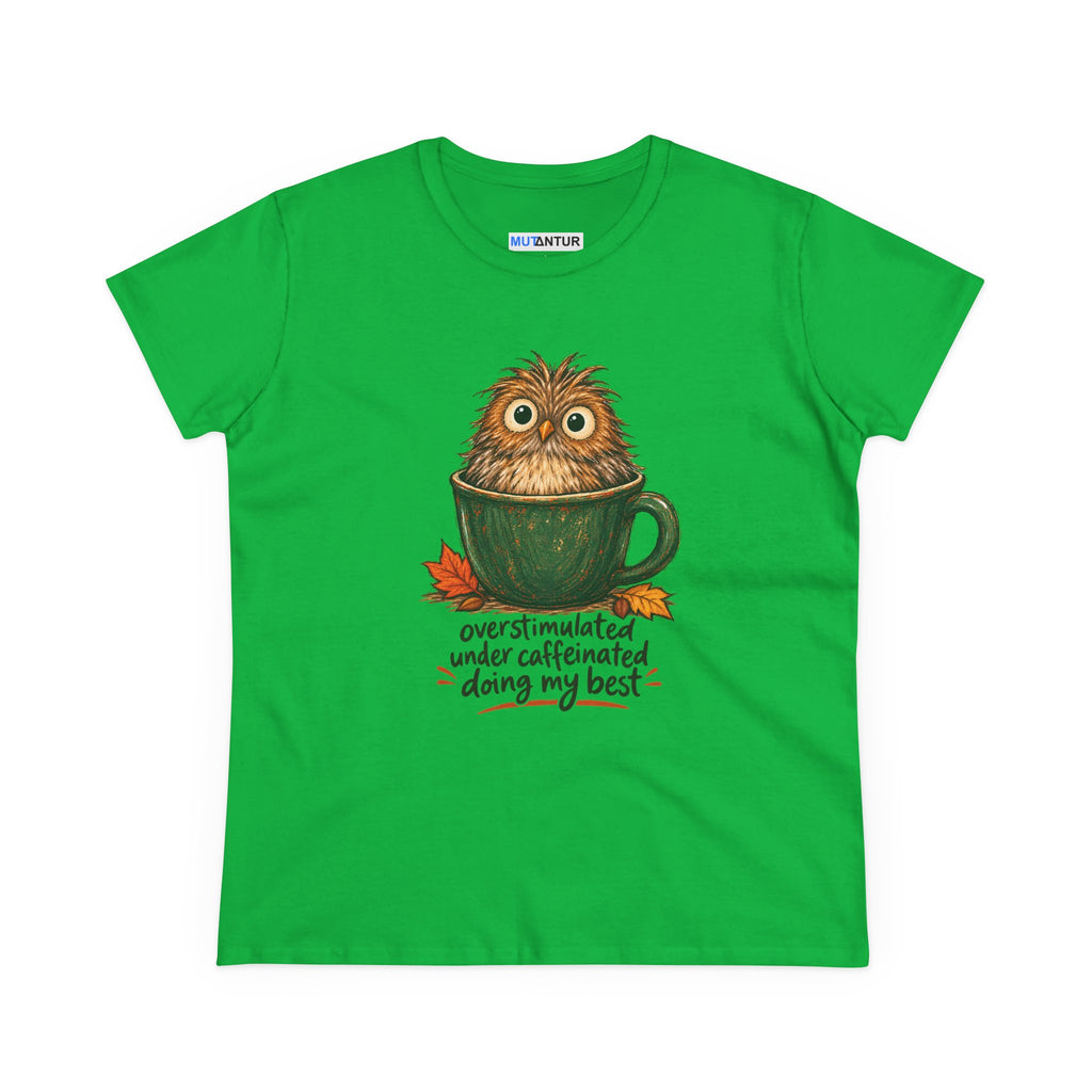 A bright green short-sleeve t-shirt with a graphic of an owl sitting in a coffee mug, surrounded by autumn leaves and the text 'overstimulated under caffeinated doing my best'. The brand name 'MUTANTUR' is visible on the inner neck label.
