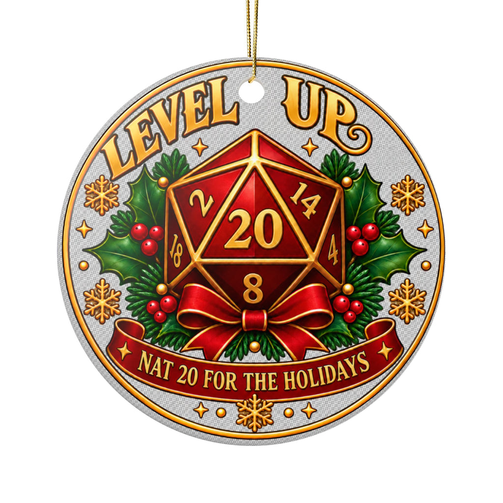 Round hanging ornament with a silver-gray textured background and a gold hanging string. The ornament features a red 20-sided die centered over green holly leaves and red berries, with the words “LEVEL UP” at the top and “NAT 20 FOR THE HOLIDAYS” on a red ribbon at the bottom.