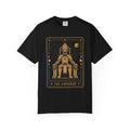 A black Crew neck t-shirt Comfort Colors t-shirt featuring The Emperor from the Future Arcana collection, inspired by The Emperor tarot card. A regal futuristic ruler sits upon a cosmic throne surrounded by celestial Art Deco details in elegant gold line art on a transparent background.